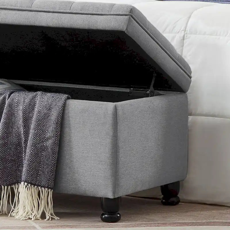 Banc de rangement capitonné en lin avec pieds en bois tournés