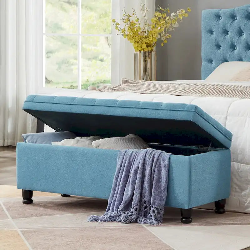 Banc de rangement capitonné en lin avec pieds en bois tournés