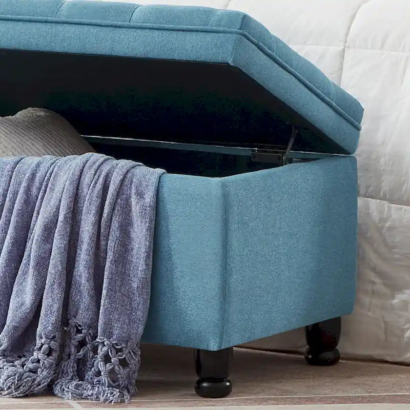 Banc de rangement capitonné en lin avec pieds en bois tournés