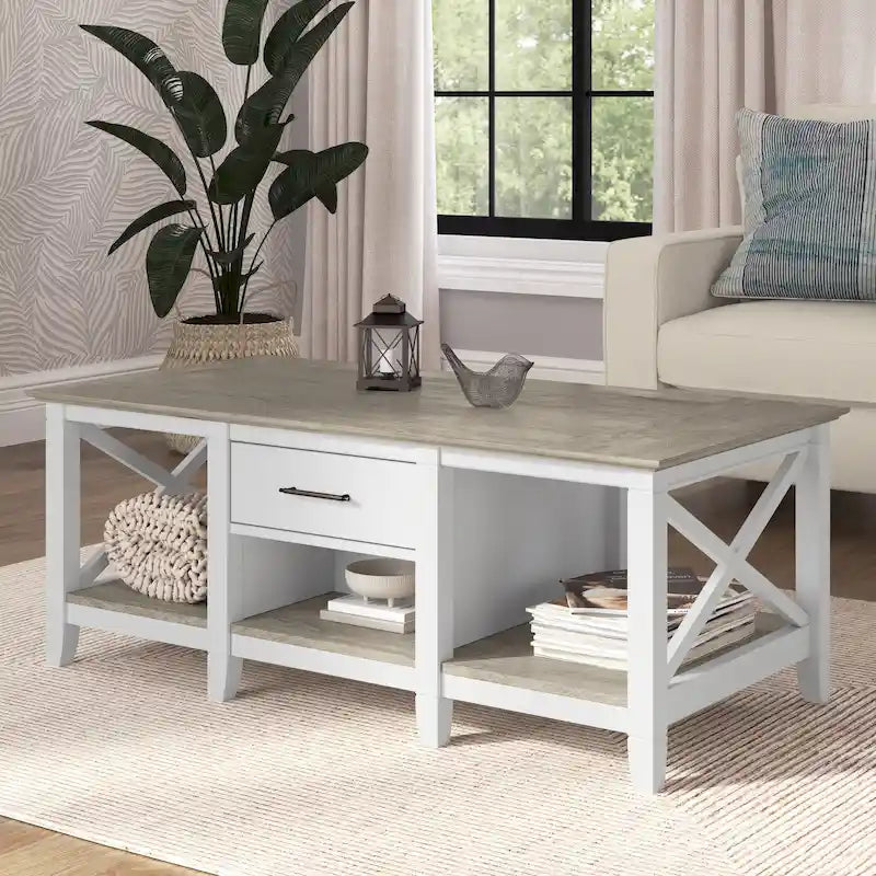 Mesa de centro blanca de estilo rústico con cajón y almacenamiento abierto, mesa para sala de estar con estructura lateral en forma de X