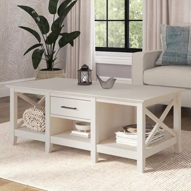 Table basse blanche de style ferme avec tiroir et rangement ouvert, table de salon avec cadre latéral en X